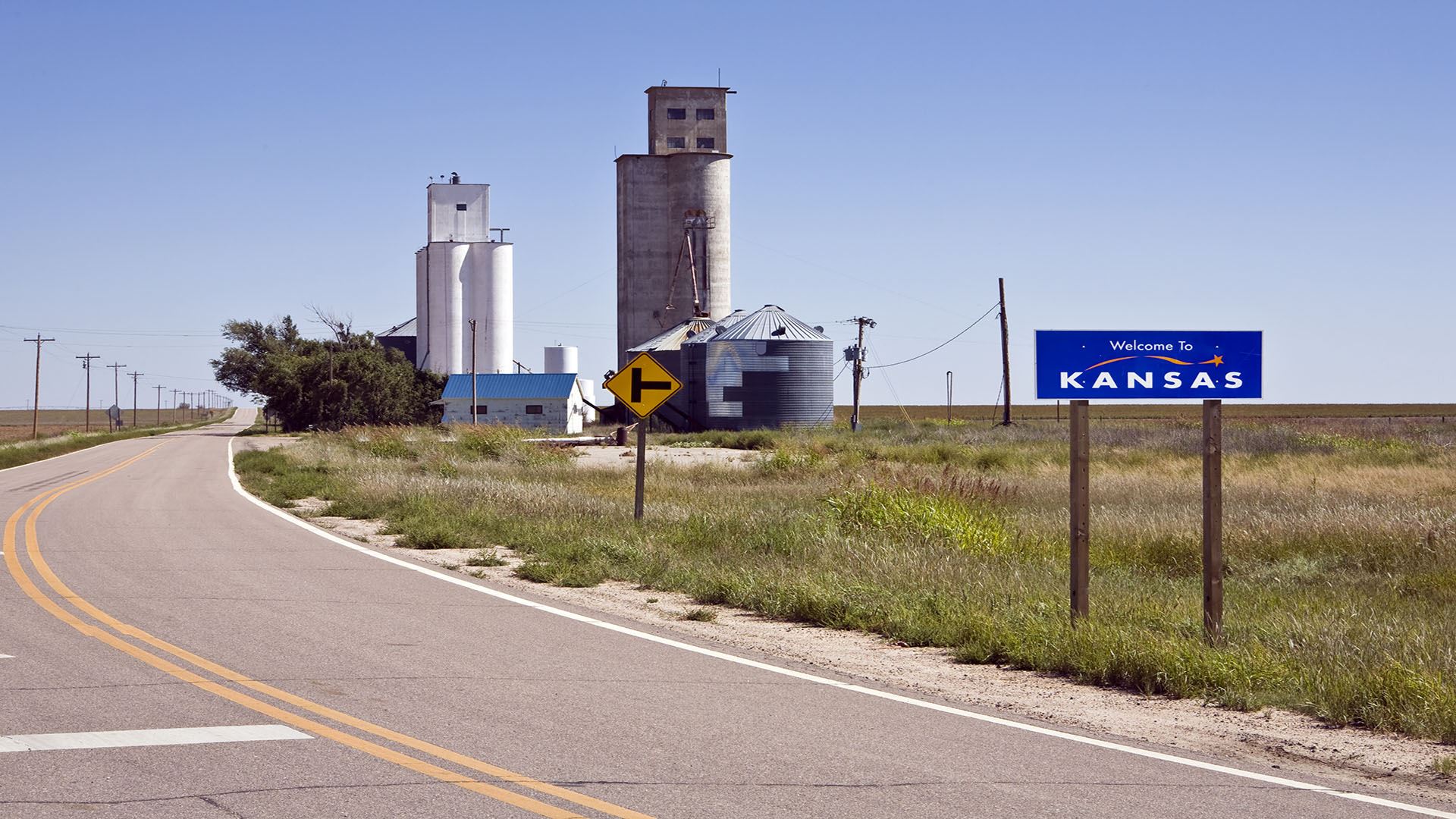 country highway entering a small Kansas town